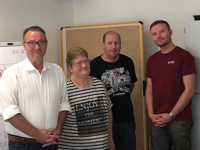 Jan Donhauser und Carsten Naumann mit den Teilnehmenden